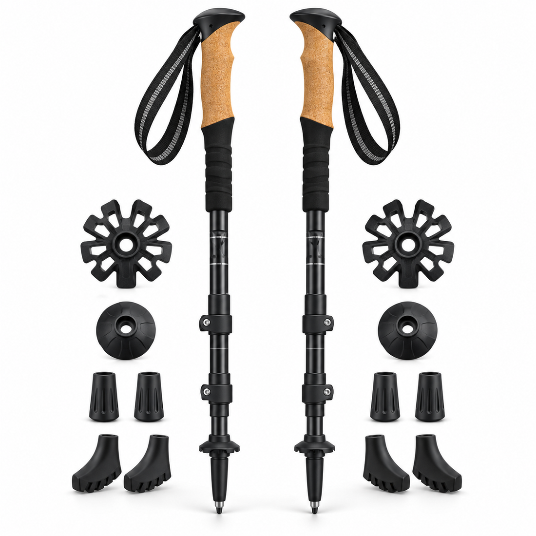 Pair of collapsible trekking poles with trail attachments on white