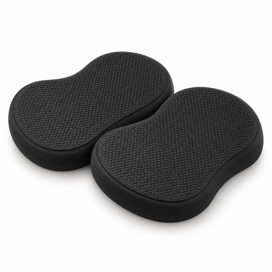 Pair of black textured yoga knee support pads on white